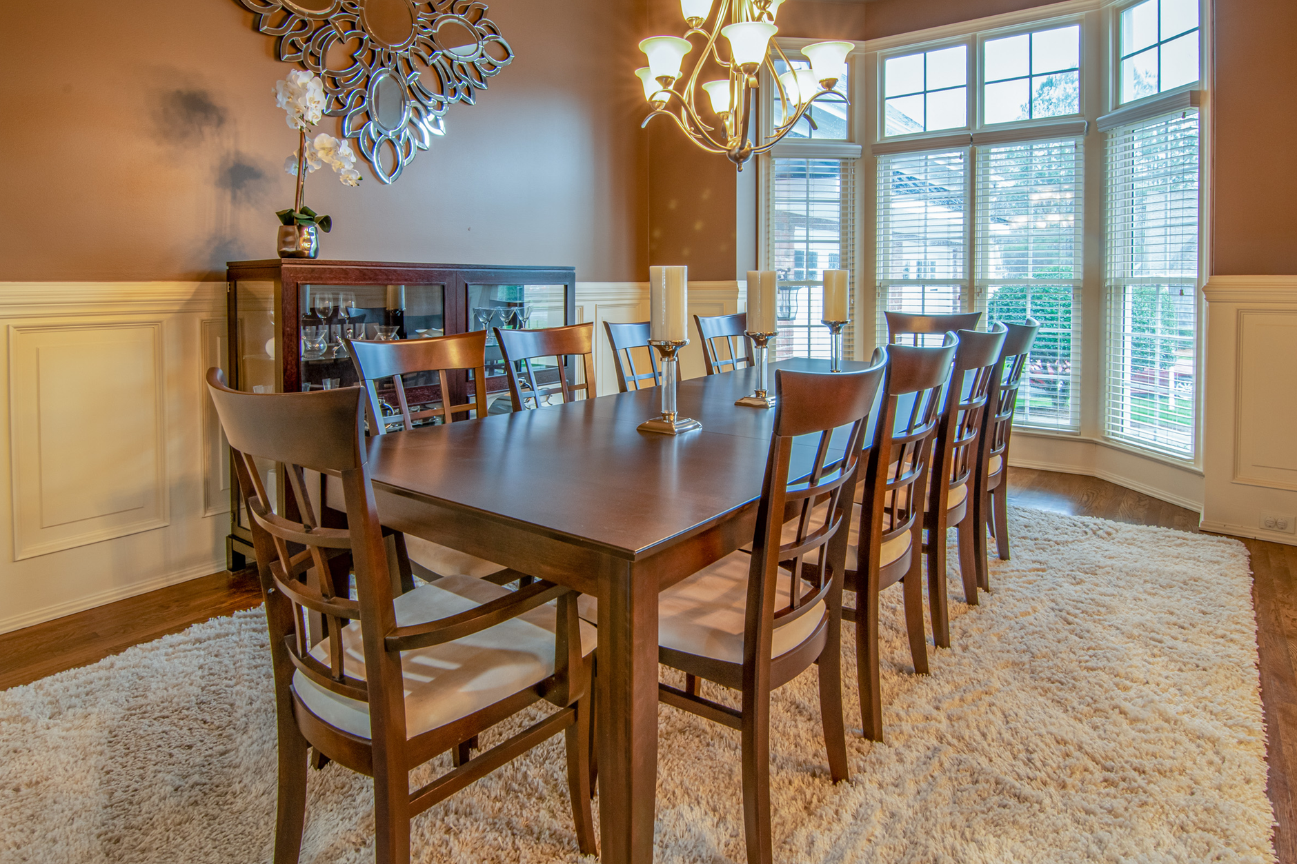 brown wooden table with chairs